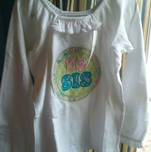 Long sleeve ruffle shirt with Big Sis applique